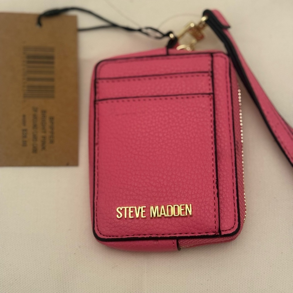 Steve Madden Vibrant Pink Card Holder with gold plated brand name on wallet.